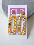Mustard Yellow White Statement Big Lucite Geometric Acrylic Large Earrings with overall length of 2.25" & width of .75" and gold surgical steel posts.