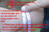 a person measuring a wrist with a bracelet, using a piece of string and a ruler to determine the correct bracelet size based on the bead size.