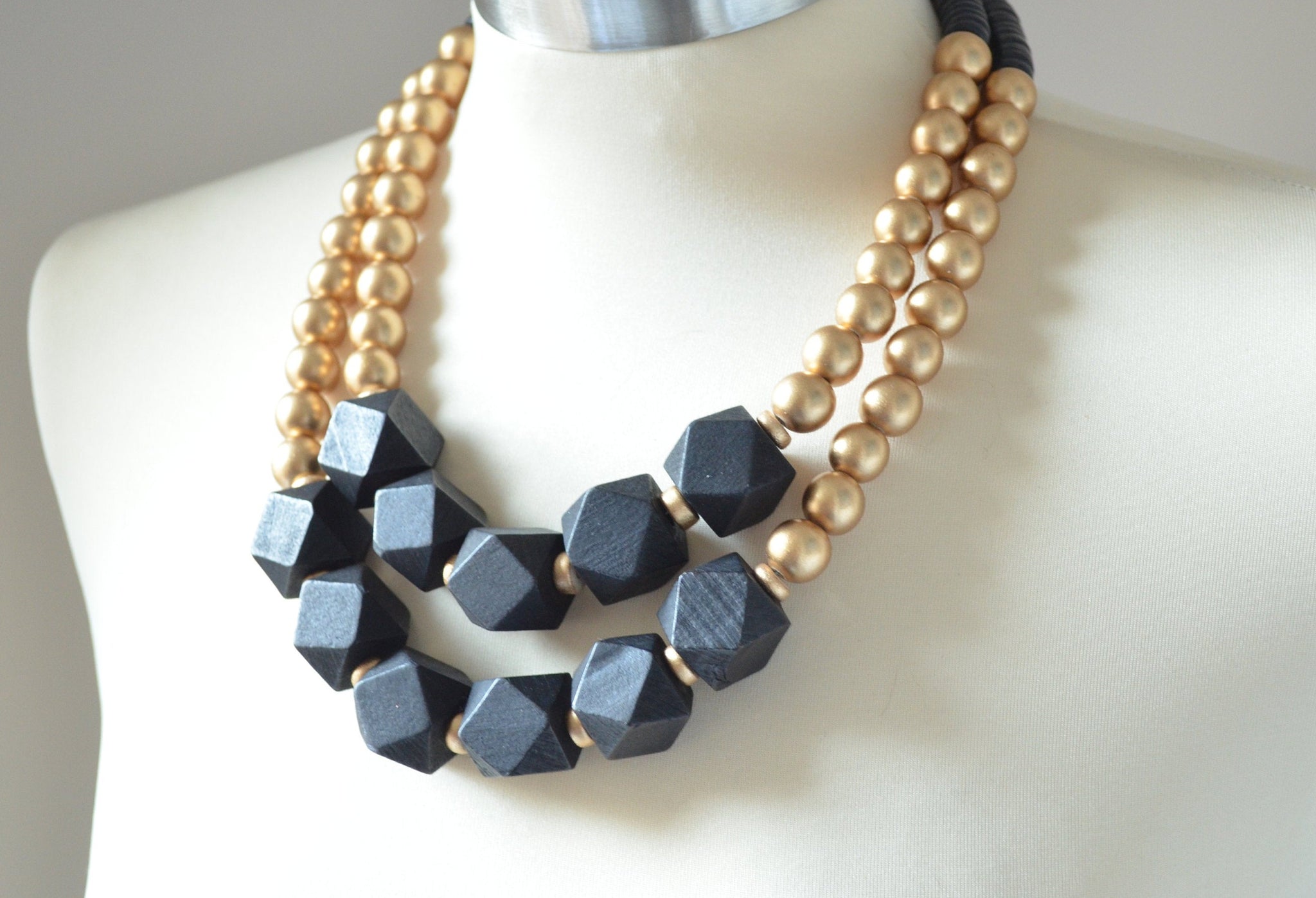 23″ orange multi-chain chunky wood beaded necklace with rhinestone-jeweled  1″ x 3/4″ AU teardrop pendant on 2-1/2″ x 1-1/4″ – Designs Beautiful LLC